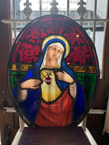 Large Antique stained glass panel of the Virgin Mary.